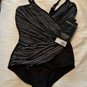 Miracle swim suit. New with tags, ordered 2 and preferred the other one.